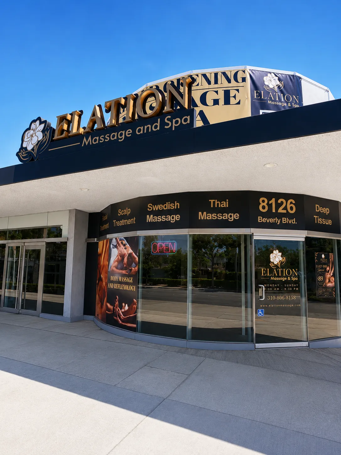 Elation Massage & Spa storefront with OPEN sign