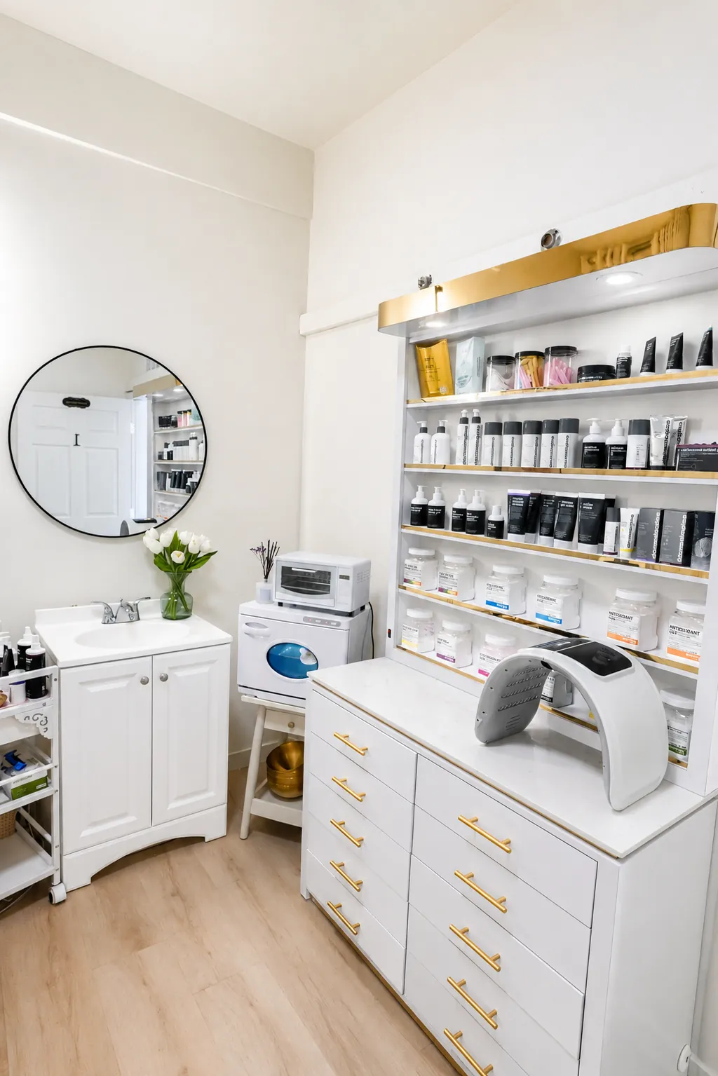 Skincare room with product shelves and LED light-therapy dome