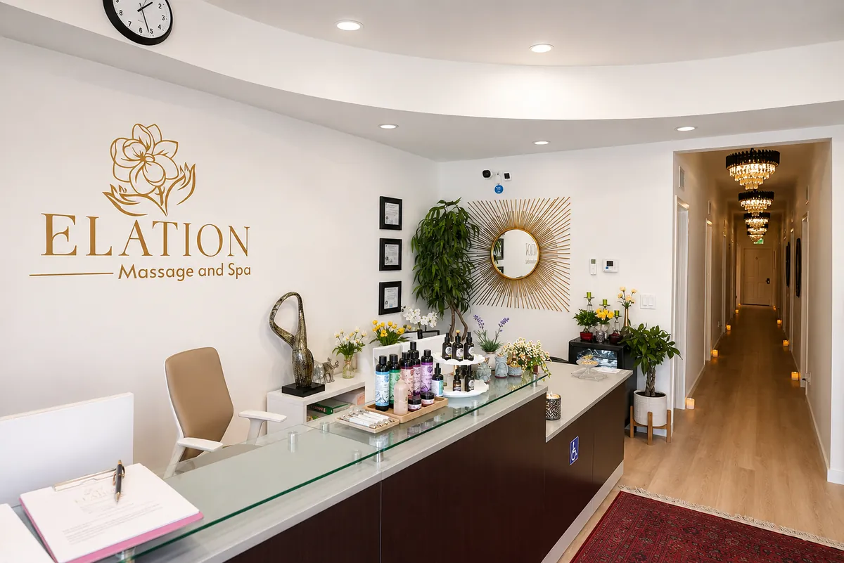 Reception area with gold Elation Massage & Spa logo